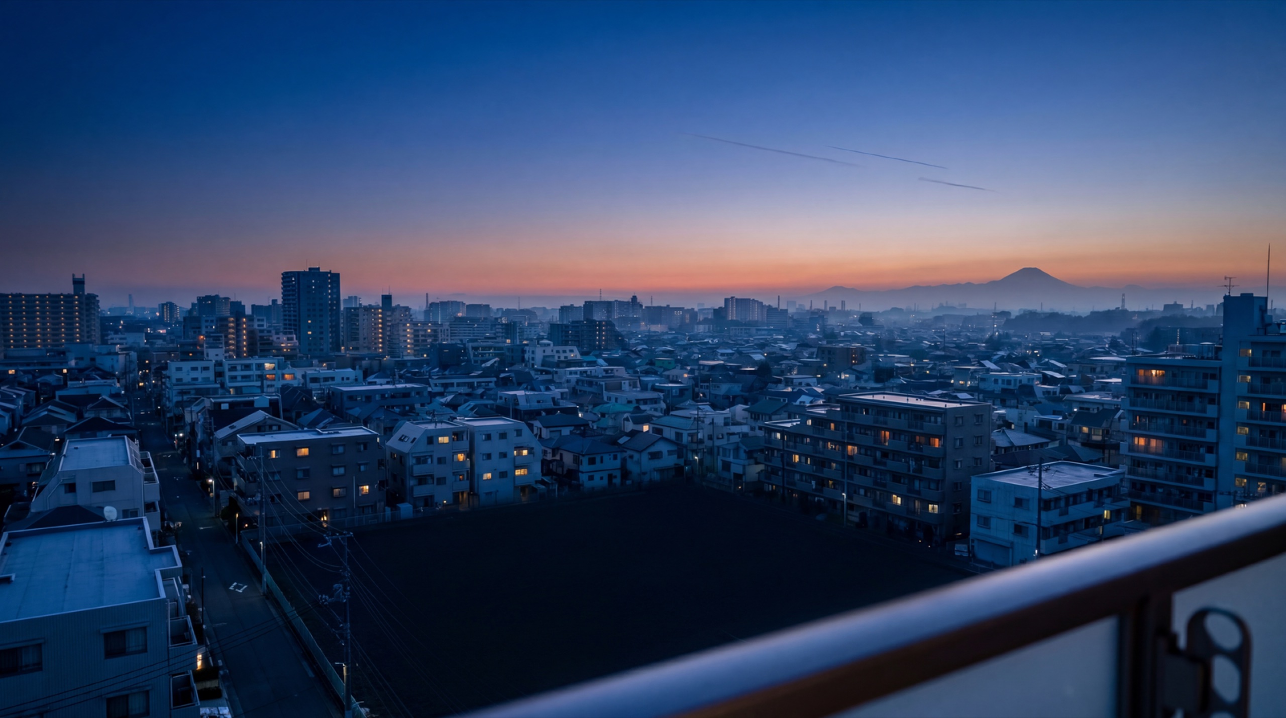 Project 06 · Life Brain — pre-dawn Tokyo, scattered warm windows, the moment before a month begins