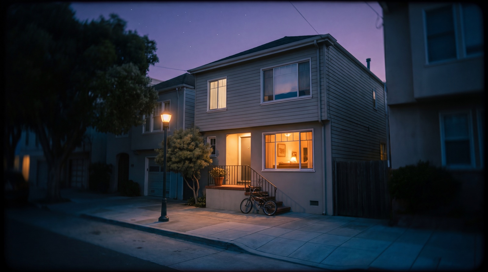Chapter 07 · Close — the family house at blue hour, warm lights through the windows